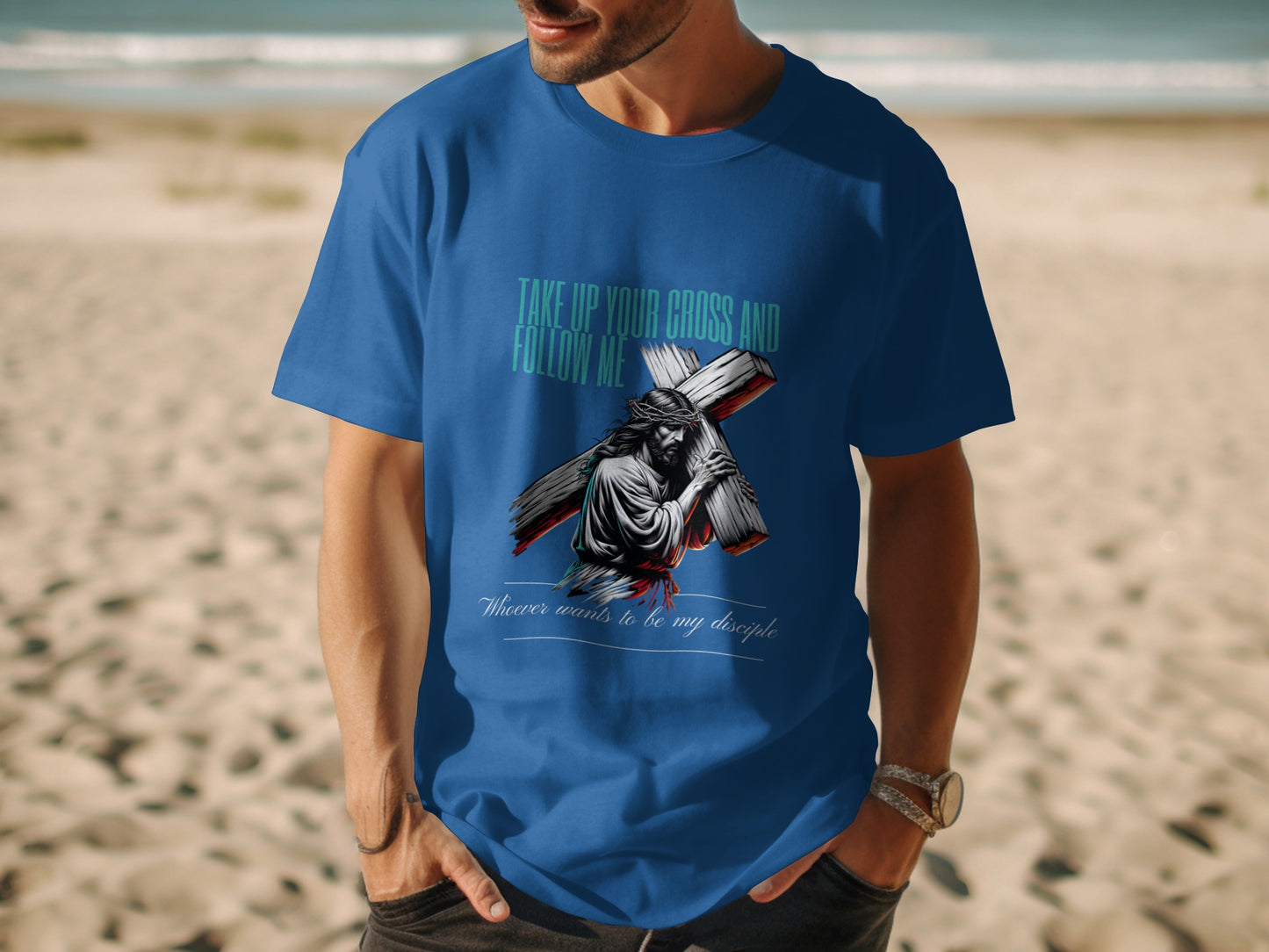Blue t-shirt with Jesus carrying the cross and the text "Take up your cross and follow me."