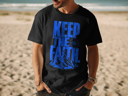 Black t-shirt with blue "KEEP THE FAITH" text and mountain graphic with cross.