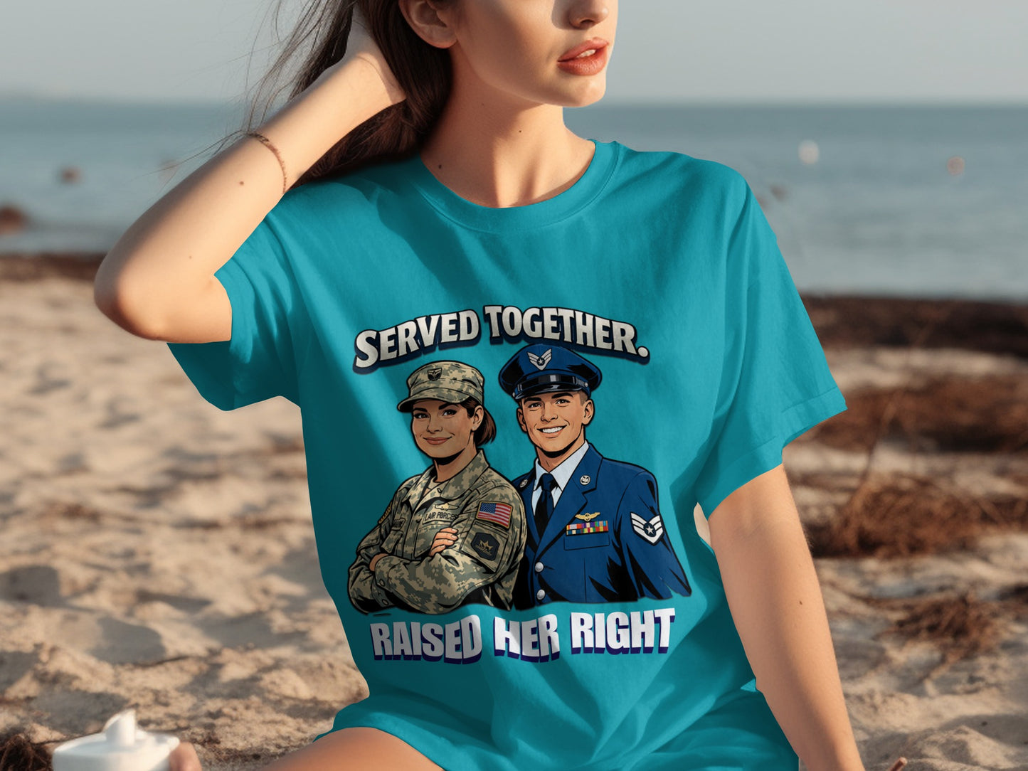"Served Together, Raised Her Right" text with military couple illustration on a teal t-shirt.