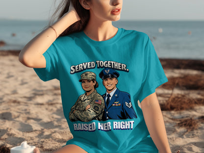 "Served Together, Raised Her Right" text with military couple illustration on a teal t-shirt.