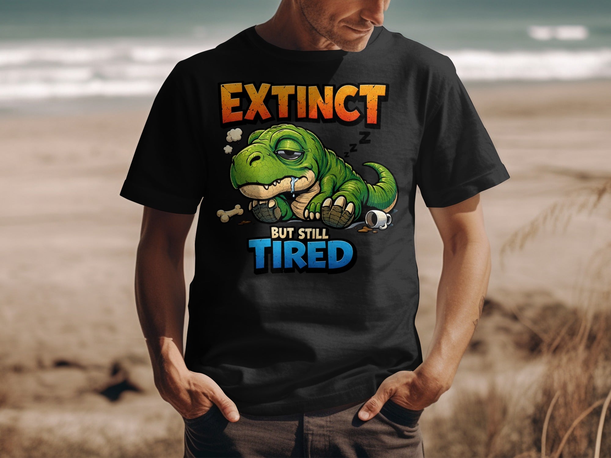 Black t-shirt with cartoon dinosaur that says "Extinct but still tired."