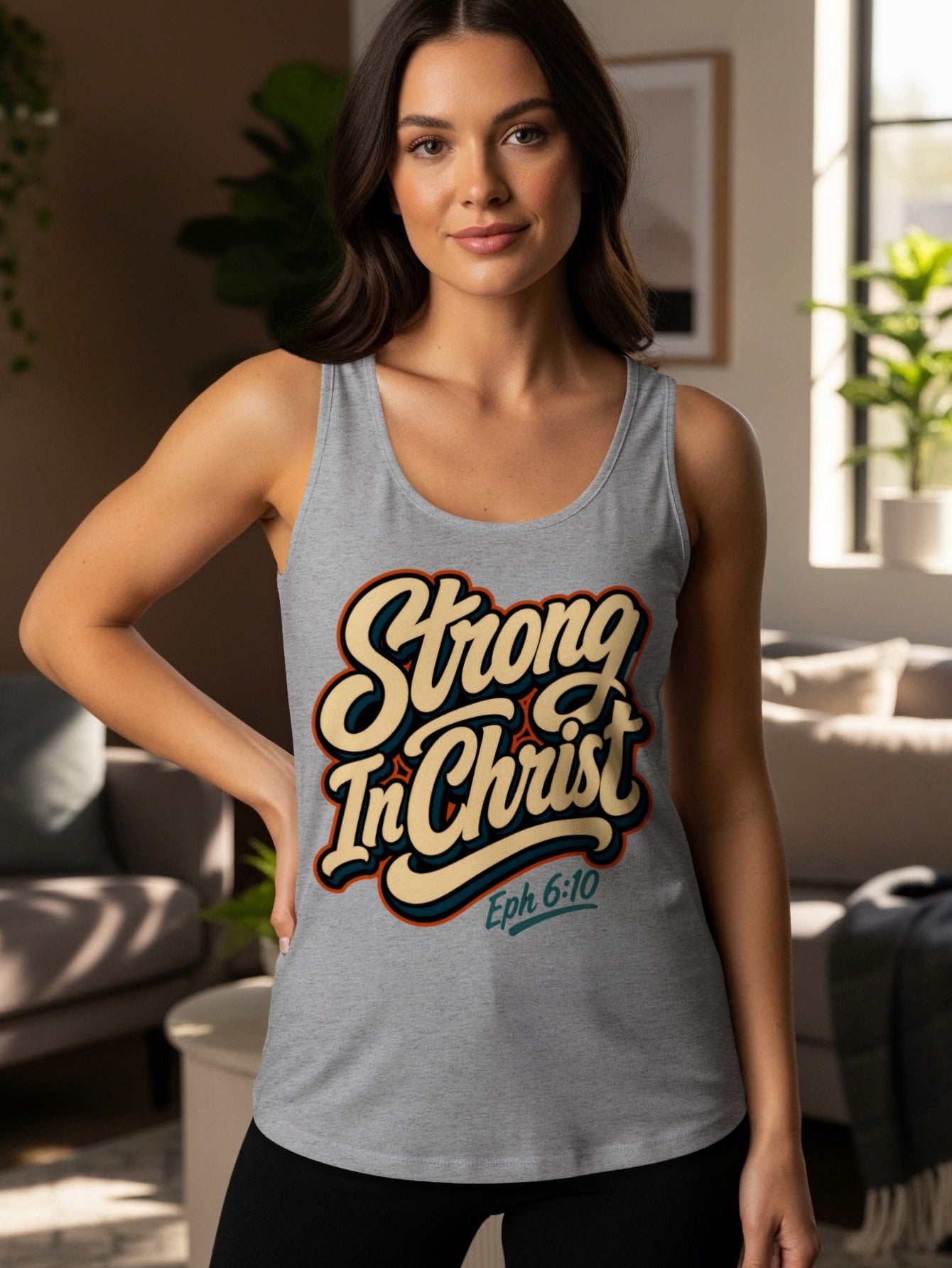 Gray tank top with "Strong In Christ" and "Eph 6:10" text.