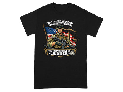 Soldier holds rifle near scales of justice with American flag and text "True Peace is Not Merely the Absence of Tension: It is the Presence of Justice."