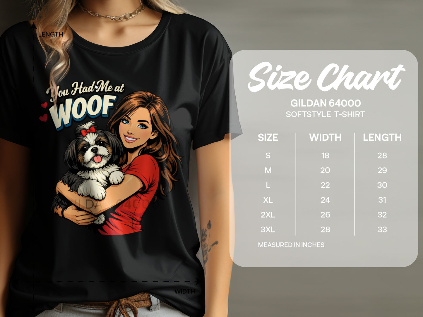 Black t-shirt with "You Had Me at WOOF" graphic and a size chart.