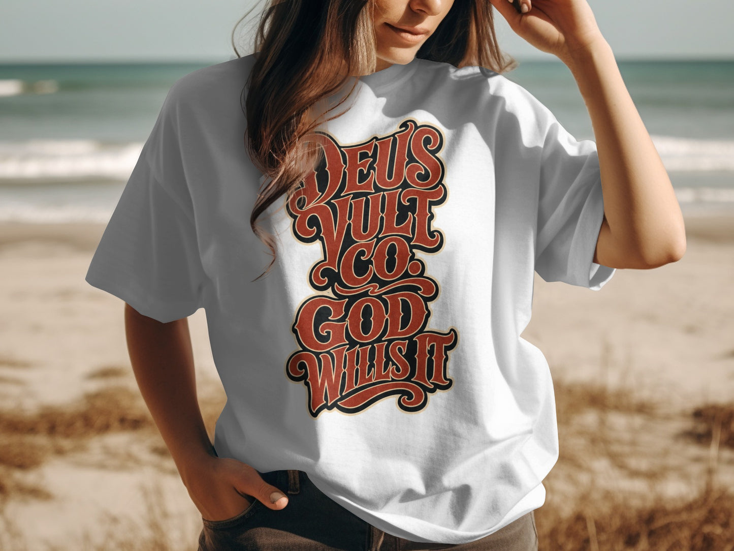 White t-shirt with red lettering that reads "Deus Vult Co. God Wills It".