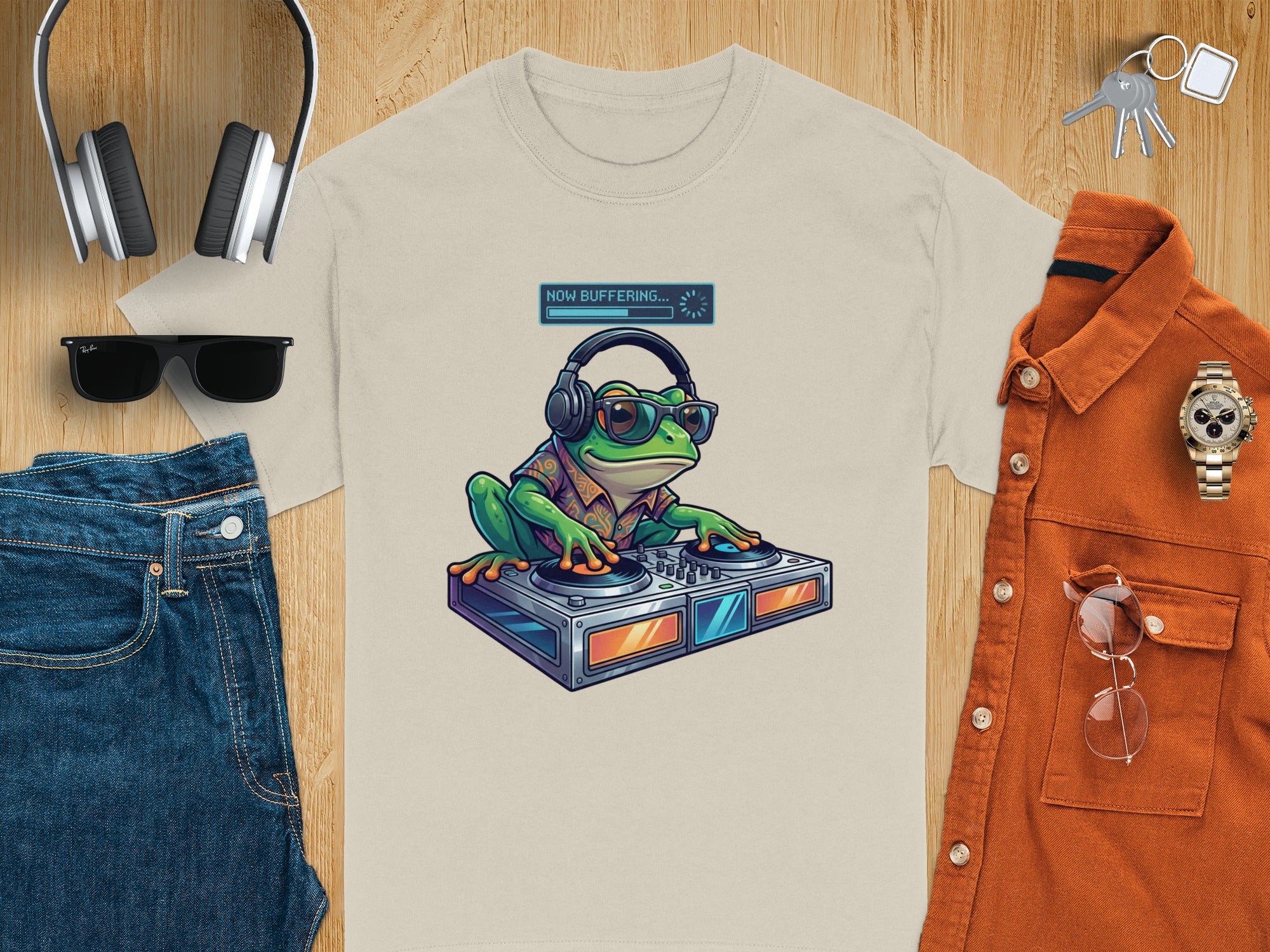 T-shirt graphic of a DJ frog wearing headphones and glasses.