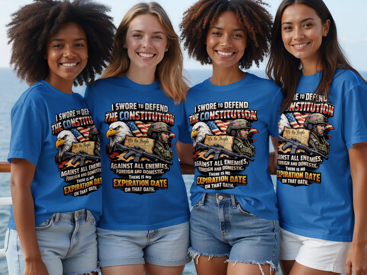 Four women in blue t-shirts with a patriotic eagle and soldier graphic.