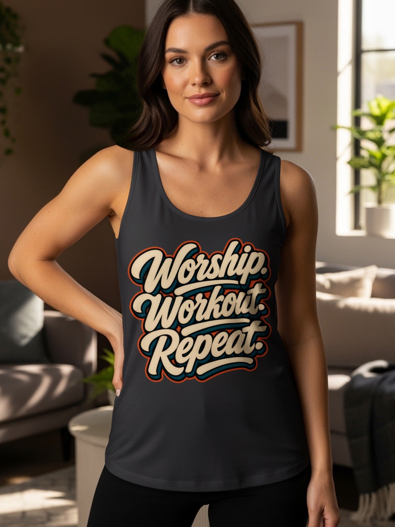 Dark grey tank top with "Worship. Workout. Repeat." text in retro lettering.