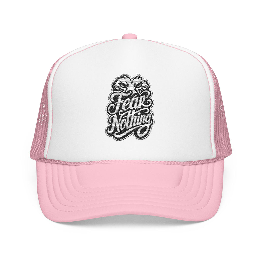 Pink trucker hat with embroidered lion heads and "Fear Nothing" text.