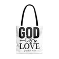 White tote bag with black text "GOD is LOVE JOHN 4:8".