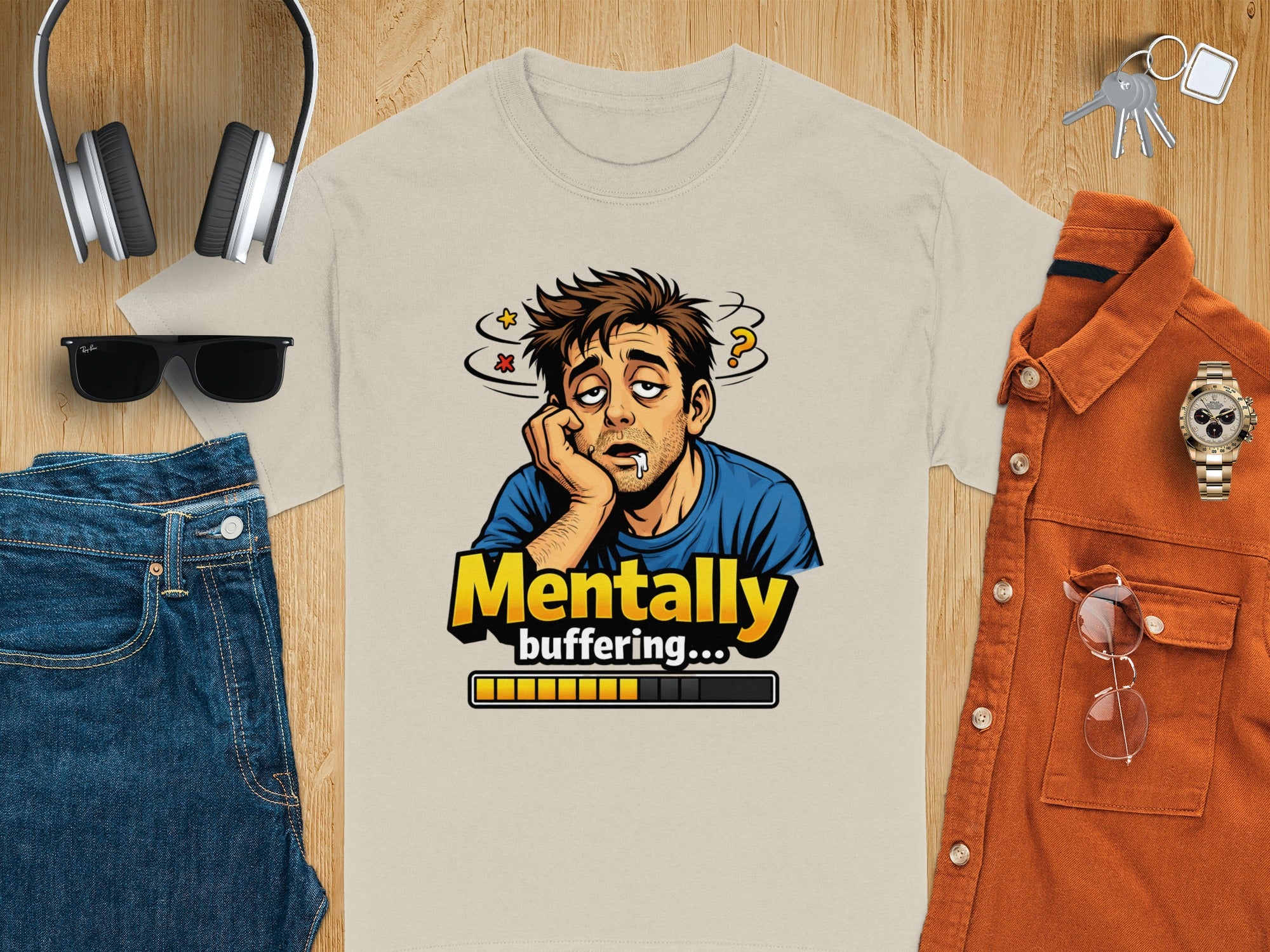 T-shirt with cartoon of tired man, text "Mentally buffering...", and loading bar.