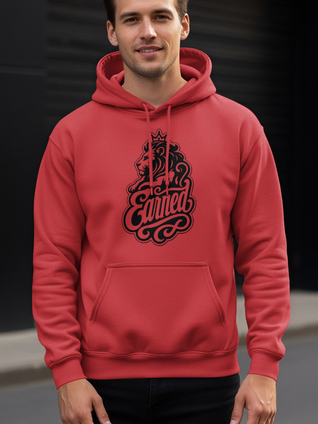 Red hoodie with black lion and crown logo and "Earned" text graphic.