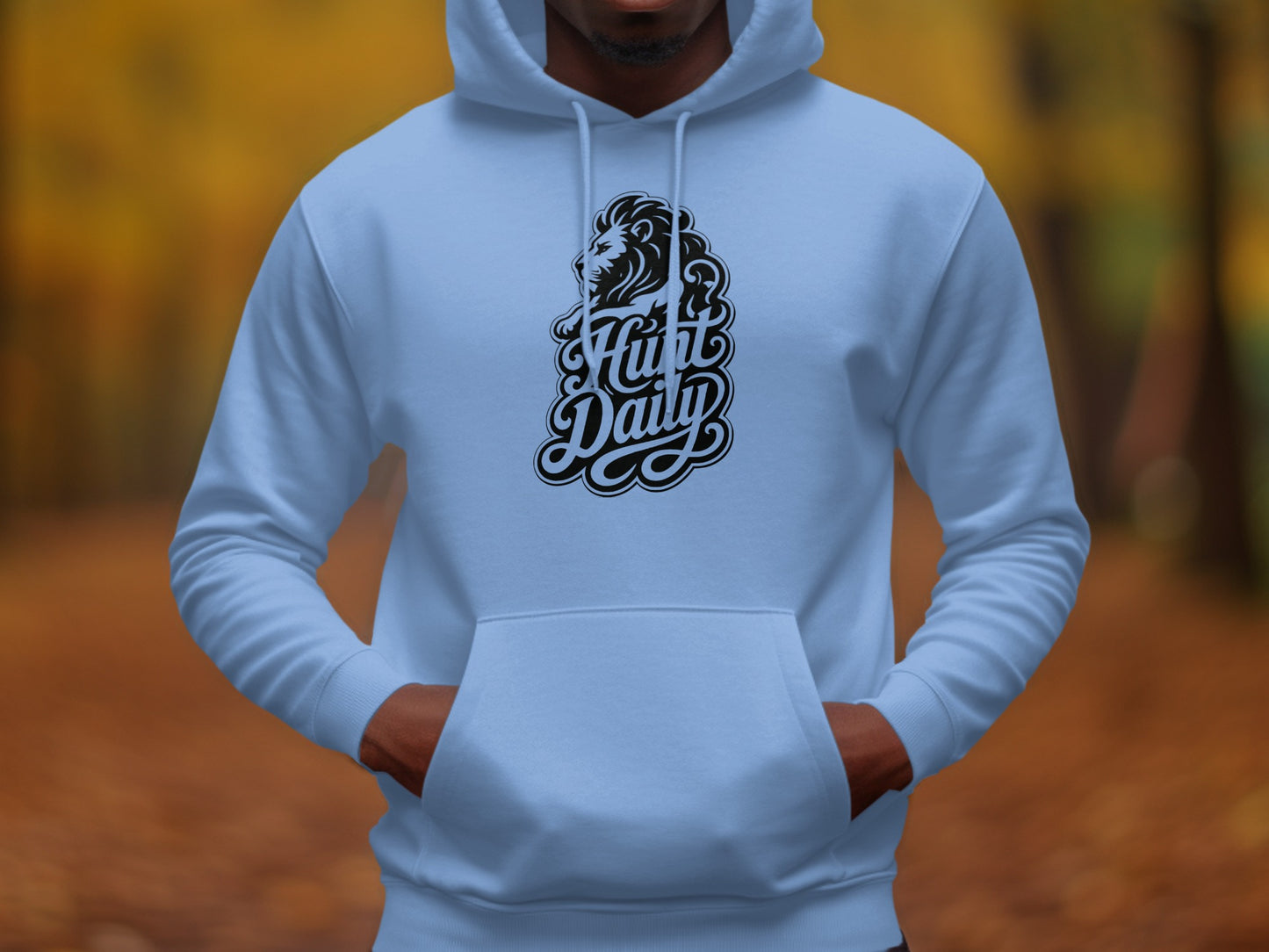 Light blue hoodie featuring a black lion head with "Hunt Daily" text.