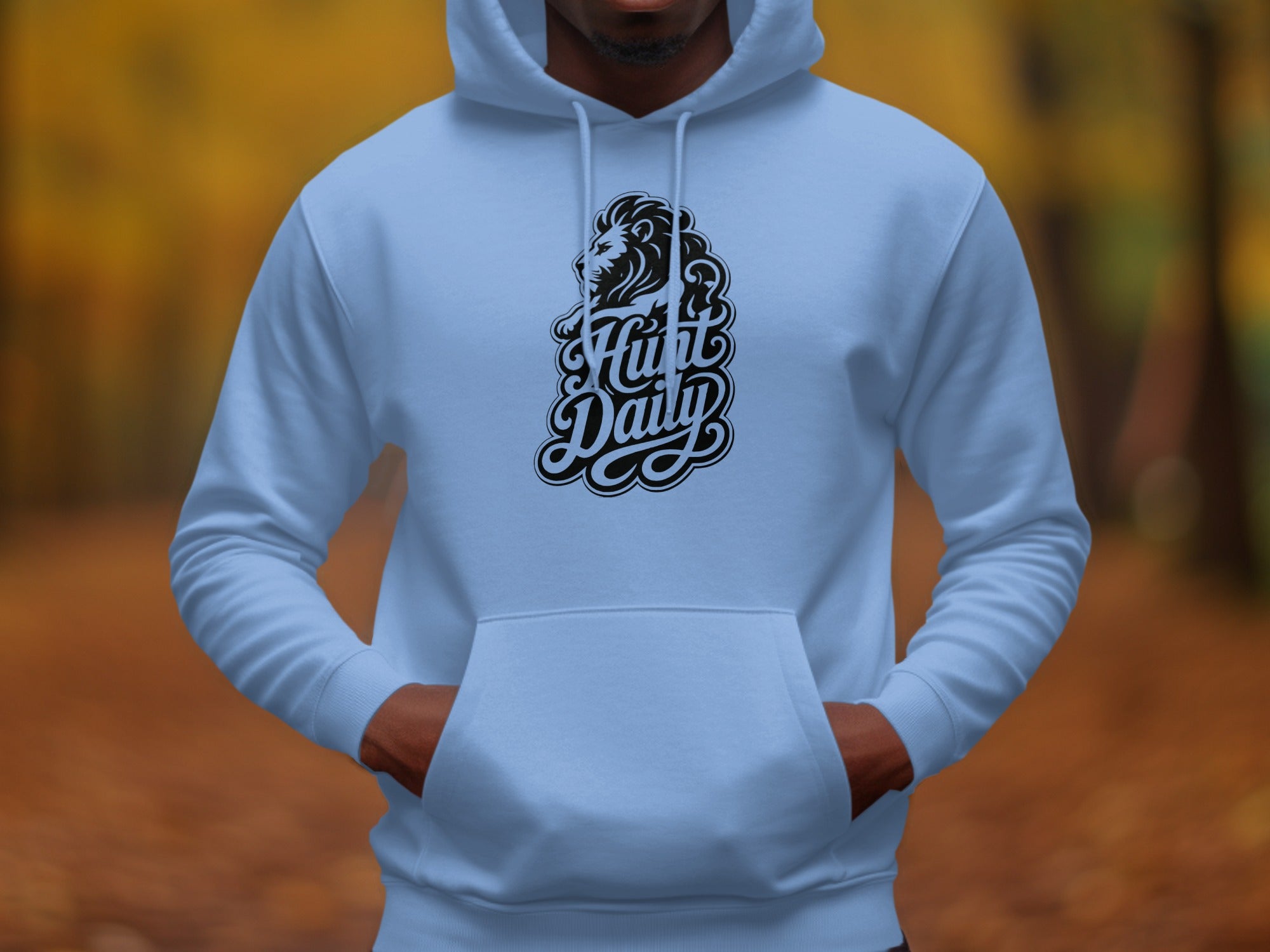 Light blue hoodie featuring a black lion head with "Hunt Daily" text.