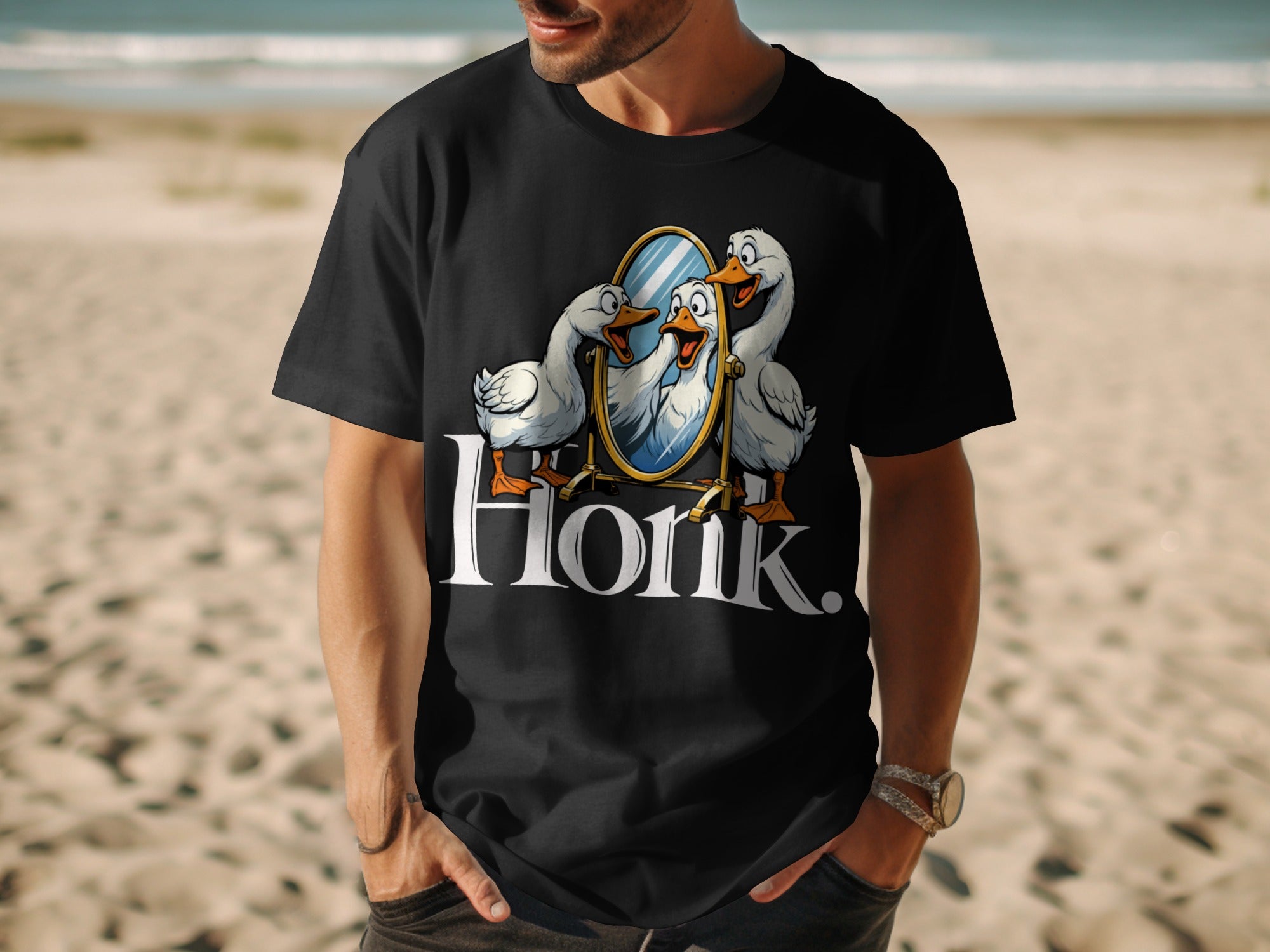 Black t-shirt with cartoon geese looking in a mirror and the word "Honk".