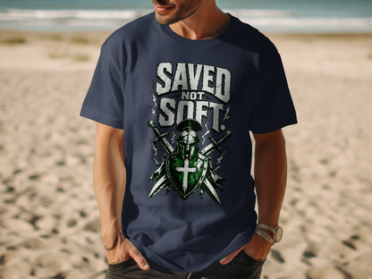 T-shirt with "SAVED NOT SOFT" text and knight's helmet and swords graphic.